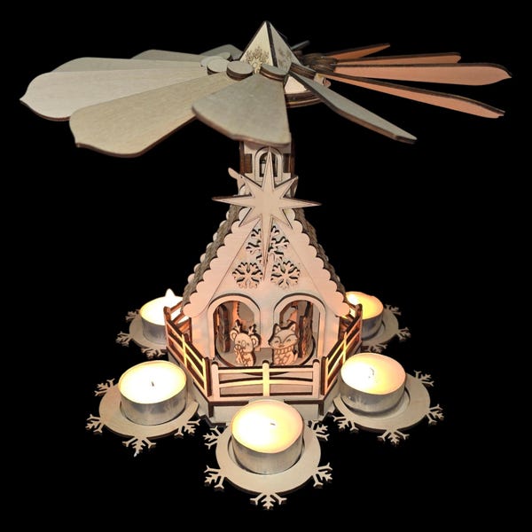 Carrusel de velas navideñas con forma de pirámide giratoria