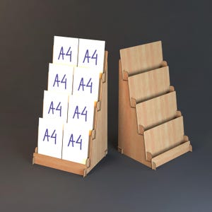 May include: Two wooden display stands. One holds white cards with "A4" in blue. The other is empty. Both have a stepped design with levels for displaying items. The stands are made of light-colored wood.