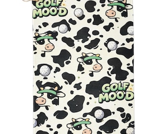 Toalla de golf con estampado de vaca adorable, estilo golf.