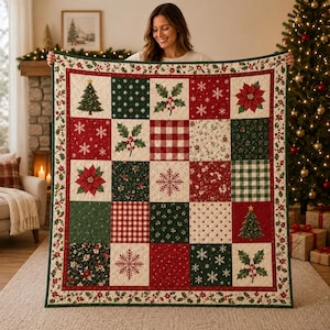 May include: A square patchwork quilt featuring a festive holiday theme with alternating blocks of red, green, and cream. The design includes patterns of Christmas trees, poinsettias, holly berries, snowflakes, and red or green gingham checks.