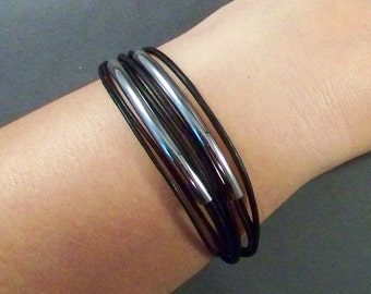 Women black leather bracelet with stainless steel tubes