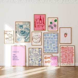 May include: A selection of framed art prints with illustrations of food and drinks. The prints include images of pasta, a coconut, and text such as "Coffee lover club" and "Ciao bell". The prints are in various colours.