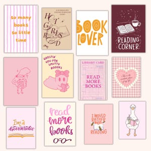 May include: A collection of pink and cream-colored art prints with book-themed quotes and illustrations. Designs include a ghost reading, a goose with a book, and the phrases "Book Lover" and "Reading Corner."