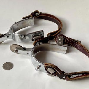 Vintage Steel Cowboy Spurs with Dollar Coin - Wild West Accessory