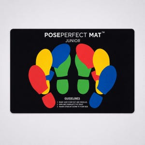May include: A black rectangular mat labeled POSEPERFECT MAT JUNIOR. The surface features colorful red, yellow, blue, and green footprints arranged in pairs. Below the footprints, the text GUIDELINES lists three instructions for body positioning.