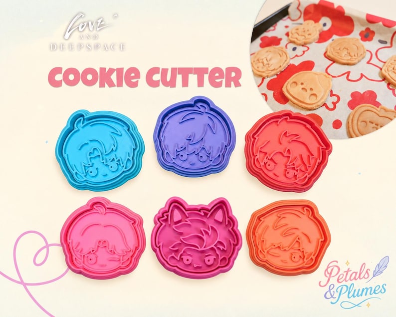 May include: A set of six plastic cookie cutters featuring stylized character faces in blue, purple, red, pink, magenta, and orange. The text LOVE AND DEEPSPACE COOKIE CUTTER is printed above the cutters, and a circular inset shows baked cookies.