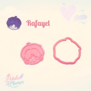 May include: A pink plastic cookie cutter set featuring a character head with a winking eye and a matching outline frame. The text Rafayel is printed in pink above the cutter, and the text Petals & Plumes is printed in the bottom left corner.