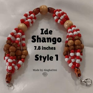 Ide Shango with beads red white and wood. Shango Bracelet