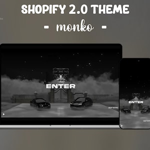 May include: A digital display of the Shopify 2.0 theme named monko, featuring a laptop and smartphone screen showing a dark, atmospheric website landing page with two cars, a gated entrance, fog, and the text ENTER and SKIP INTRO.