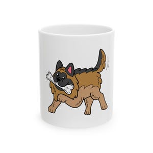 White Ceramic Dog Lover Mug With a Cartoon of German Shepherd Holding a White Bone in Mouth