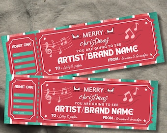 Op de afbeelding: Twee rode kerstkaartjes met witte tekst en muzieknoten. Op de kaartjes staat "MERRY christmas" en "YOU ARE GOING TO SEE ARTIST/BRAND NAME". Elk kaartje heeft een sectie om de naam, het adres en de code in te vullen.