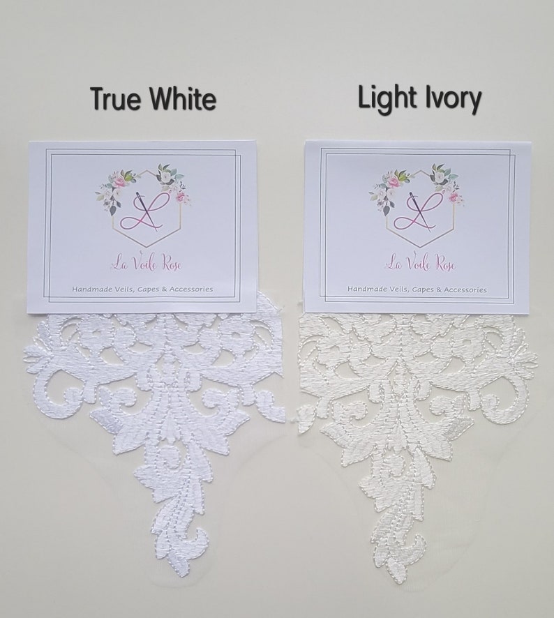 A pair of detachable, double layer puff sleeves, made of ultra soft tulle and floral lace.