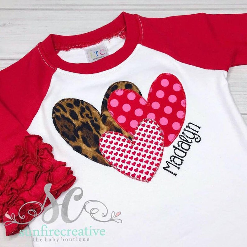 red shirt with leopard heart