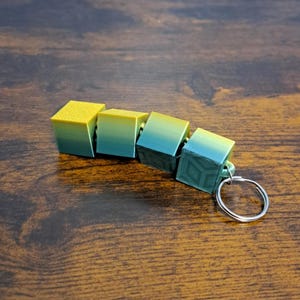 Twist and Tinker Cube Keychain – 3D Printed Fidget Toy by PNW 3D Critters