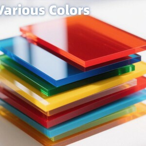 May include: A stack of colorful, transparent acrylic sheets in various colors, including red, orange, blue, green, and yellow. The text "Various Colors" is displayed at the top. The sheets are stacked on top of each other.