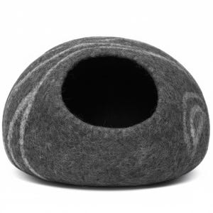 May include: A gray felt pet cave with a round opening. The cave has a rounded shape with a swirl pattern in a lighter shade of gray. The interior is dark. This pet bed is designed for small animals.