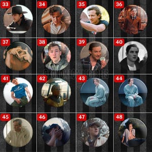 May include: A collection of round pinback buttons featuring various portraits of people. The buttons are arranged in a grid pattern against a black and gray striped background. Each button displays a different person, with varying expressions and attire.