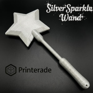 Silver sparkle wand with a star-shaped top and a long handle. The wand is silver and has the text "Silver Sparkle Wand" in a decorative font. The wand is made by Printerade.