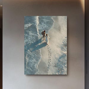 Bible wall art - Jesus Carrying Woman Art – Photorealistic Beach Scene with Footprints | Inspirational Poster, Canvas or Framed Wall Decor