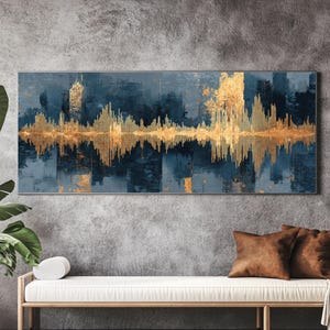 Puede incluir: Obra de arte abstracta con un diseño en oro y azul marino. La obra tiene una orientación horizontal y representa un patrón de onda de sonido. La paleta de colores incluye oro, azul marino y toques de azul claro, creando una estética moderna.