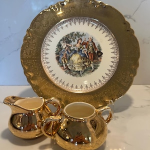 Vogue Dinnerware Warranted 22k Gold Washington Courting Couple Plate with matching creamer and sugar