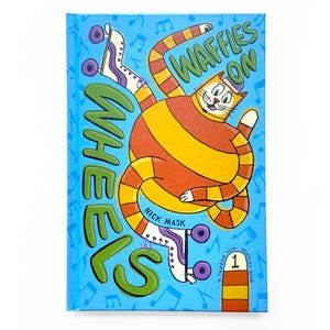 May include: A children's book cover titled "Wheels on Waffles" featuring a cartoon cat wearing a hat and roller skates. The cat is orange and yellow striped. The background is light blue with musical notes.