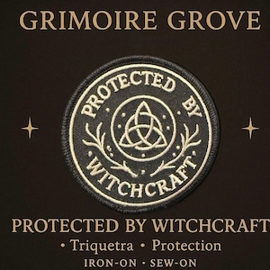 May include: Black circular patch with the text "PROTECTED BY WITCHCRAFT" around a central triquetra symbol. The patch also includes the text "GRIMOIRE GROVE", and the words "Triquetra" and "Protection". The patch is iron-on or sew-on.