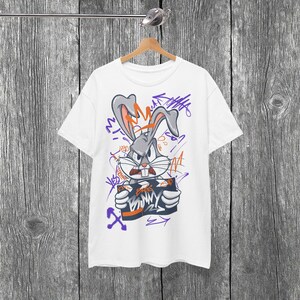 Camiseta gráfica de estilo urbano con foto policial de conejito, estilo grafiti, aspecto vintage, estilo urbano, unisex, estética de dibujos animados genial