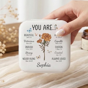 May include: White square jewelry box with the words "YOU ARE..." and inspirational text. Features a floral design and butterfly accents. The name "Sophia" is printed at the bottom.