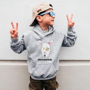 Playful Youth Hoodie with Hoodwink Bunny Design, Sweatshirt for Kids, Fun Gift for Birthdays, Easter, or Cozy Days