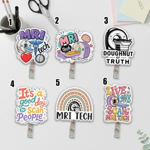 May include: Six badge reels featuring MRI technician themes. Designs include an MRI machine with a caduceus and brain, a purple scanner with the text MRI tech, a scanner with the text DOUGHNUT OF TRUTH, the phrase It's a good day to scan people, a rainbow with MRI TECH, and the text LIVE LOVE SCAN MRI TECH.
