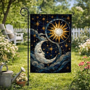 May include: A rectangular garden flag featuring a stained glass style design of a golden sun and a crescent moon with a human face. The background is a deep blue night sky filled with yellow stars and swirling clouds, suspended on a black metal stand.