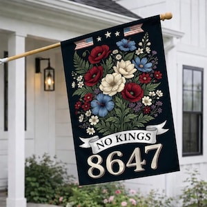 May include: A dark blue garden flag displays a floral arrangement of red poppies, white and blue flowers, and green foliage. The flag has the text "NO KINGS" and the number "8647" in white.