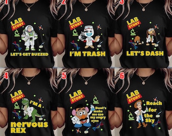 Puede incluir: Camisetas negras con diseños de personajes de dibujos animados. Cada camiseta presenta el logotipo "LAB STORY" y un personaje diferente con temática científica. Las frases en las camisetas incluyen "LET'S GET BUZZED", "I'M TRASH", "LET'S DASH", "I'M A NERVOUS REX", "Don't make me use my angry eyes" y "Reach for the Sky".