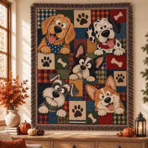 May include: A woven throw blanket featuring a patchwork design of various dog breeds including a golden retriever, dalmatian, french bulldog, schnauzer, and corgi, interspersed with paw print and bone icons in red, blue, and tan colors.