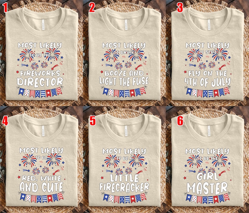 May include: A collection of six beige t-shirts, each featuring a unique patriotic design. The designs include fireworks, text like "Fireworks Director," and phrases related to the 4th of July, all in red, white, and blue.