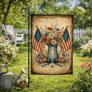 May include: A rectangular garden flag featuring a vintage-style illustration of a blue pitcher filled with red, white, and blue flowers, flanked by two American flags. A blue ribbon with a star is tied around the pitcher on a beige background.
