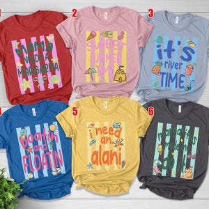 May include: A collection of six t-shirts with summer-themed graphics. The shirts are in various colors, including red, pink, blue, yellow, and gray. Each shirt features vertical stripes and text like "Mama Needs a Margarita" and "Sweet Summer Time".