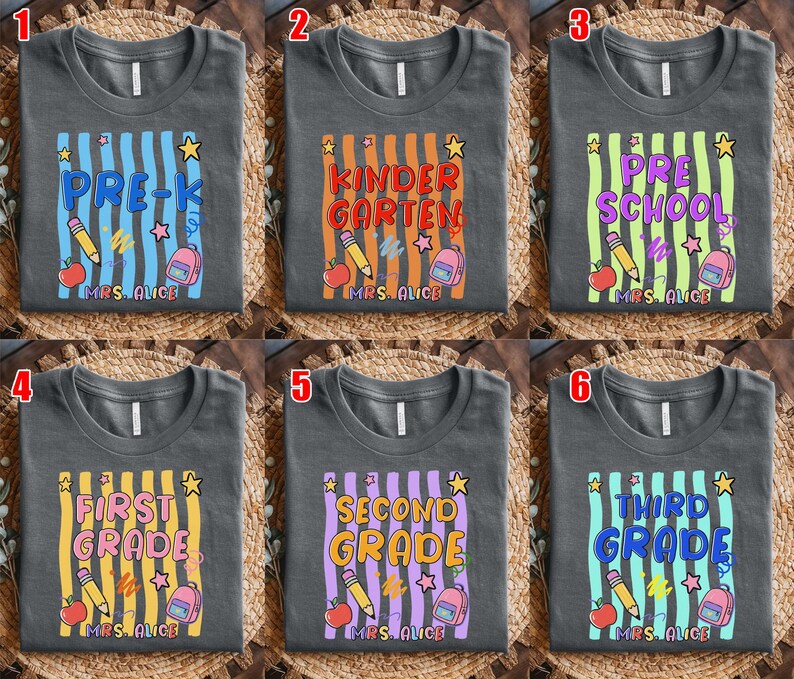May include: Gray t-shirts with colorful vertical stripes and school-themed graphics. Each shirt features a different grade level: Pre-K, Kindergarten, Preschool, First Grade, Second Grade, and Third Grade. Includes pencils, apples, stars, and backpacks.