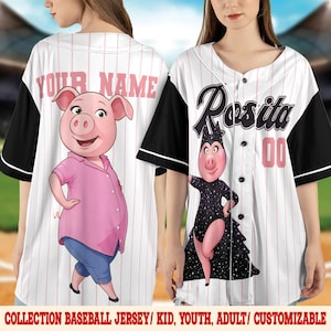May include: A white baseball jersey with thin pink pinstripes and black sleeves. The back features a cartoon pig in a pink shirt and blue pants with the text YOUR NAME. The front displays the name Rosita, the number 00, and a pig in a black outfit.