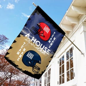 May include: A house flag with a football theme. The flag features a red and a blue football helmet, with the words "A House Divided" and "Team Name" printed on it. The flag is hanging outside a white house.
