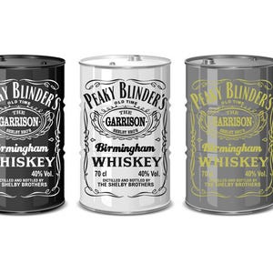 May include: Three whiskey barrels, each with the "Peaky Blinder's" logo and "Birmingham Whiskey" text. The barrels are black, white, and grey. Each label includes "The Garrison", "70 cl" and "40% Vol."