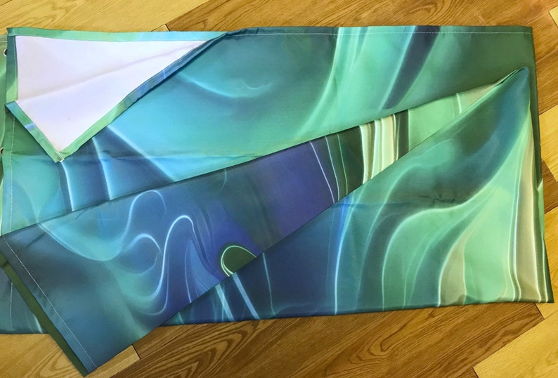 Vivid blue and green abstract art shower curtain with flowing underwater foliage by Primal Painter folded