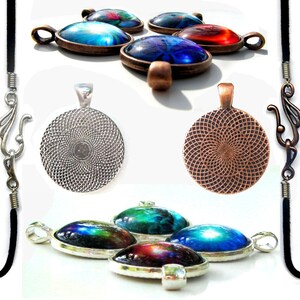 May include: A set of five round glass cabochons with colorful galaxy designs, set in silver and copper bezels. The cabochons are attached to black cord necklaces with silver and copper clasps.