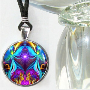 round twin flames necklace featuring  a psychedelic art print of two angels hand in hand sitting on a violet flame heart