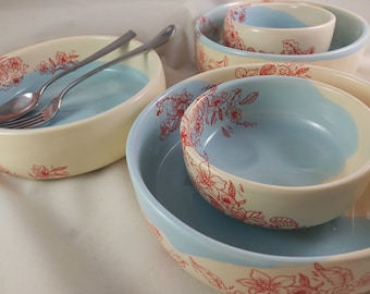 set of bowls, light blue glazed bowls, red floral patterned bowls, stackable set of bowls, large and small sized ceramic bowls, ceramics