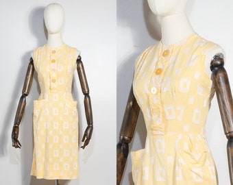 vintage 1950s tailored yellow rectangle pattern sheath dress | 50s pale yellow tailored geometric dress with statement pockets | S