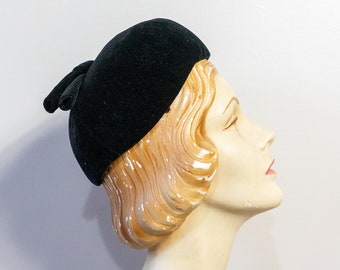 vintage 1960s black velvet pillbox hat with decorative tie | 60s Adolfo at Saks Fifth Avenue mod beret