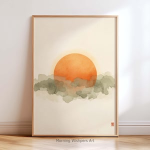 Könnte beinhalten: Ein gerahmter Aquarelldruck mit einer orangefarbenen Sonne, die über grünen und grauen Wolken untergeht. Das Kunstwerk hat einen minimalistischen Stil mit einer warmen Farbpalette. Der Text "Morning Wishpers Art" steht unten.