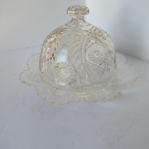 May include: A set of three ceramic mugs with a speckled, matte finish. The mugs are in shades of cream, light gray, and dark gray. Each mug has a simple, minimalist design and a rounded handle.